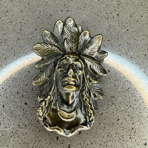 Brass Indian head belt buckle from 1975 vintage​​